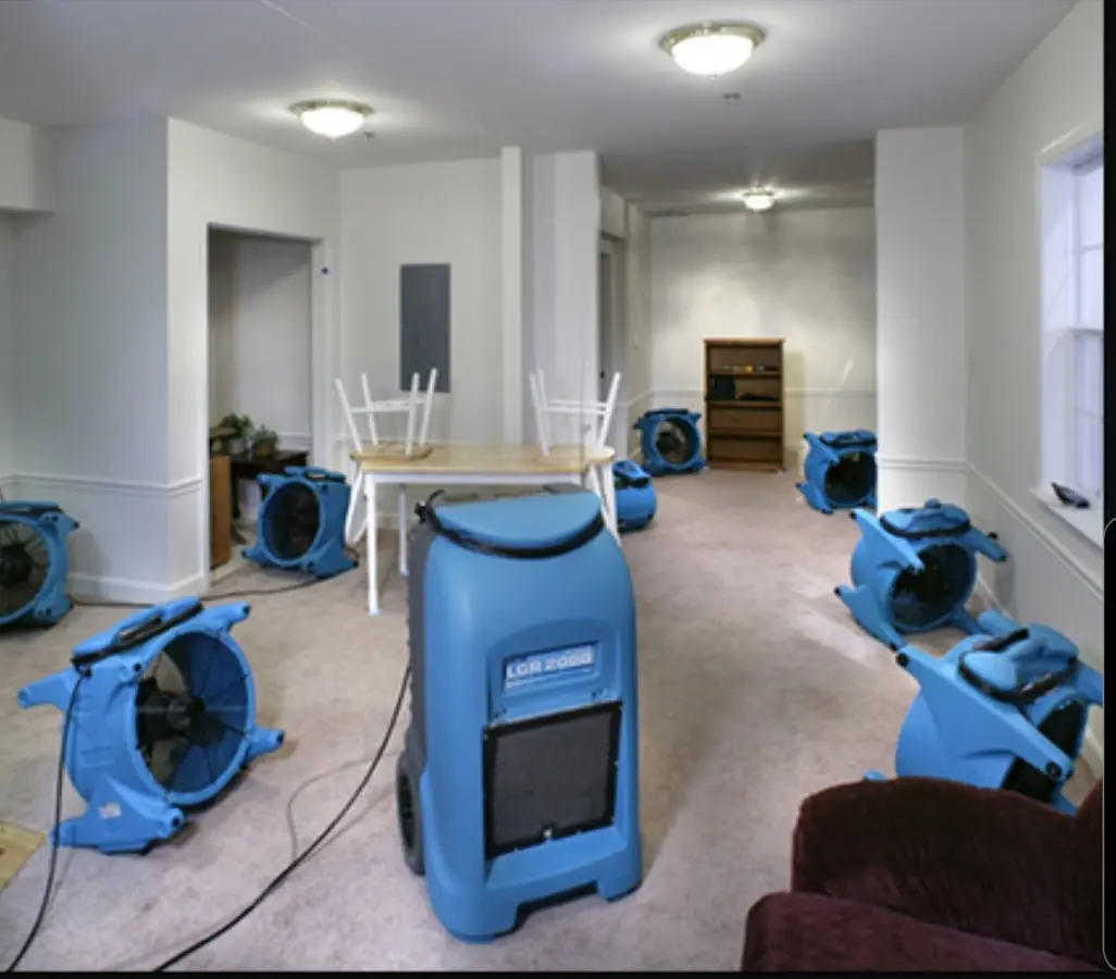 Air movers and dehumidifier setup for Water Damage Restoration in Taylors